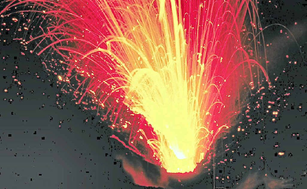 FIRED UP: Mt Yasur erupts in colourful and dramatic fashion. FIRED UP: Mt Yasur erupts in colourful and dramatic fashion.